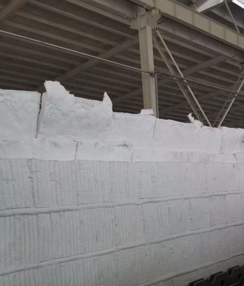 Ceramic fiber module installation with stud welding